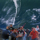 A 200-foot wave bears down on Palestinians clashing with Israeli soldiers in the West Bank town of Hebron.